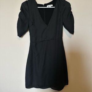 Mini black cleavage dress